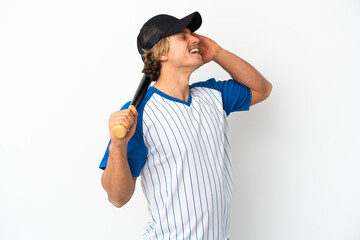 Young blonde man playing baseball isolated on white background smiling a lot