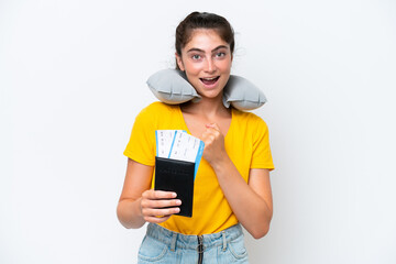 Young caucasian woman with Inflatable travel pillow¬†isolated on white background celebrating a victory