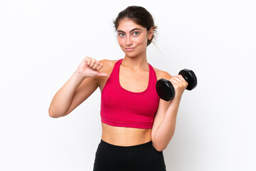 Fototapeta na wymiar Young sport caucasian woman making weightlifting isolated on white background proud and self-satisfied