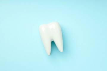 Concept of dental care on blue background
