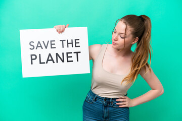 Young caucasian woman isolated on green background holding a placard with text Save the Planet