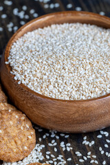 oatmeal thin round cookies with lots of sesame seeds