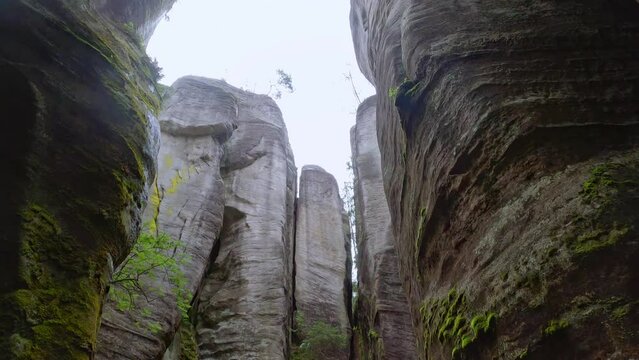 POV through narrow canyon of Adersbach rock town, Czech Republic