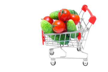 Cucumbers and tomatoes in a miniature push cart