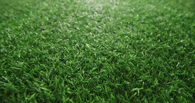 Closeup of green artificial grass, Slider shot
