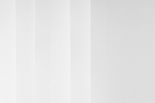 White abstract geometric background with soft light parallel paper stripes with gradient and copy space in simple minimal elegant modern style.
