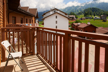 mountain hotel, room reservation, view from the balcony to nature, forest and mountains