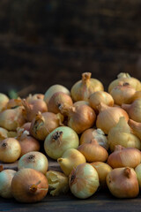 Fresh Red onion in basket on wooden table, top view, Organic food brown slices, still life rustic  raw cutting board outside wicker basket Bulb Food Ingredients local farmers market store