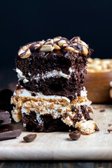chocolate cake with nut filling and peanuts