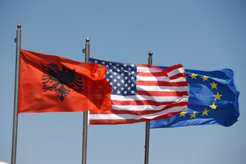 Albanese, American and European flags