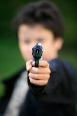 Boy with toy gun