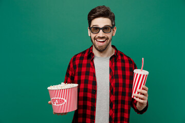 Young surprised excited cool cheerful caucasian man he in 3d glasses watch movie film hold bucket...