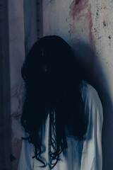 Girl ghost woman death the horror is screaming darkness and nightmare background of scary fear on...
