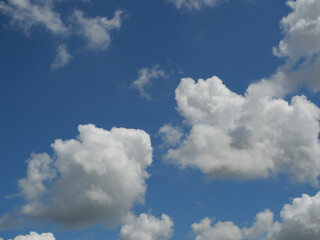 Naklejka na ściany i meble Cumulus cloud on beautiful blue sky in day light , Fluffy clouds formations at tropical zone