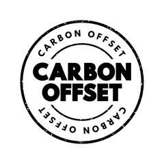 Carbon offset - reduction of emissions of carbon dioxide made in order to compensate for emissions made elsewhere, text concept stamp