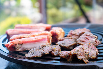 Meat cooking on open flame. Bbq meat.
