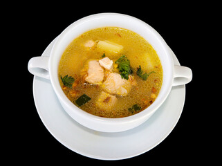 delicious and healthty chicken soup in a white bowl