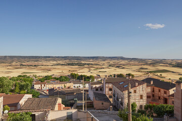 Fototapeta premium Landscape of a village and of the fields of castilla
