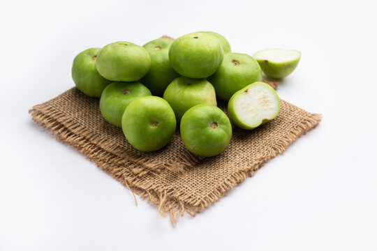 Raw Tinda, tinde also called dhemse, Apple Gourd, Baby Pumpkin, Indian Squash Round Melon.