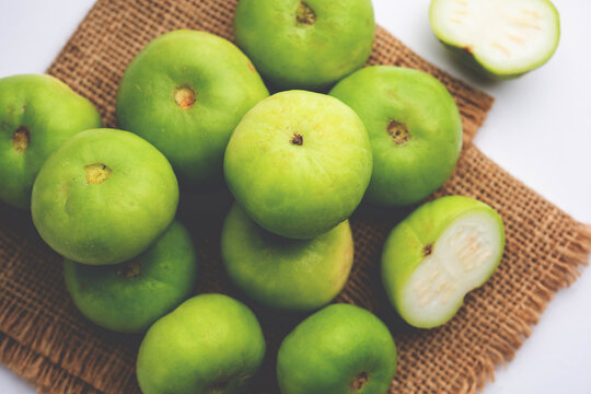 Raw Tinda, tinde also called dhemse, Apple Gourd, Baby Pumpkin, Indian Squash Round Melon.