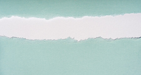  Torn craft turquoise paper with white copy space