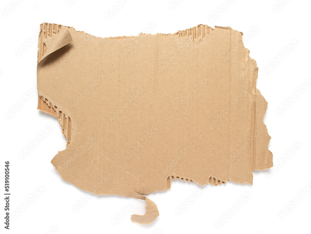 Sticker piece of cardboard torn edge isolated on white background. brown ripped paper