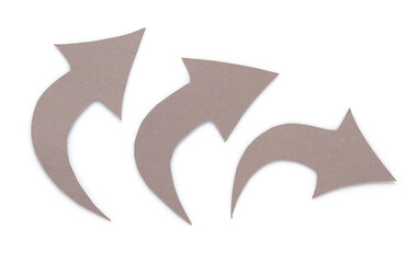 Сardboard or paper arrows isolated on white background