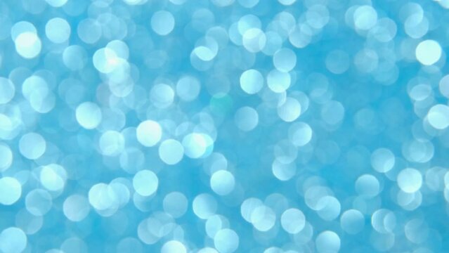 Blue, white, silver, gray Christmas New Year background with glowing and sparkling defocused lights. Festive background. White or silver lights on a background. video clip hd