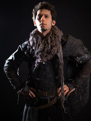 A guy in a steampunk or post-apocalyptic image, portrait on a black background