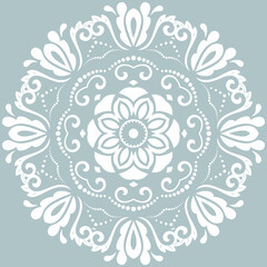 Oriental pattern with arabesques and floral elements. Traditional classic round white ornament. Vintage pattern with arabesques