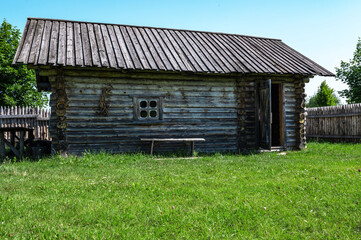 Old authentic wooden house. Remnants of Ancient house. Ancient traditional ukrainian rural cottage.
