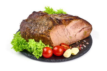Baked pork meat on stone plate isolated on white background.
