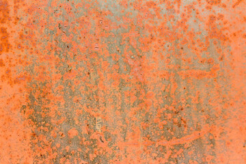 Abstract orange background with defects and rust