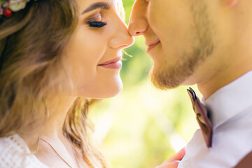 Fototapeta premium close-up of the face of the guy and the girl. they lean their he
