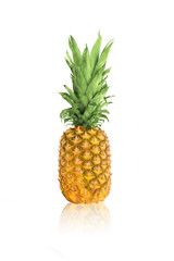 Ripe, yellow pineapple isolated on white background