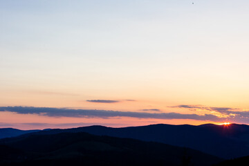 Fototapeta premium Beautiful sunset landscape with mountains