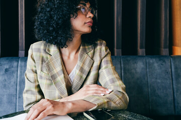 portrait of a business lady sitting at meeting room of hotel congress