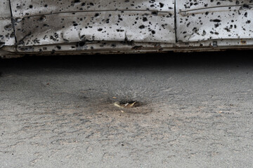 war in Ukraine. Car graveyard. Cars of civilians were shot. Russia's war against Ukraine. Exploded car. Cars damaged after shelling. irpin bucha. war crimes