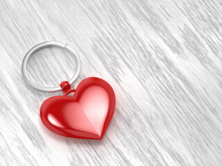 Keyring with shiny red heart on wood background