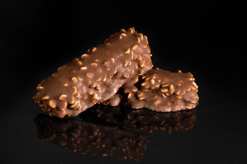 Chocolate bars on black background. Milk chocolate
