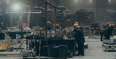 Steel Factory with workers in process of work, industrial interior, large hangar with iron production.