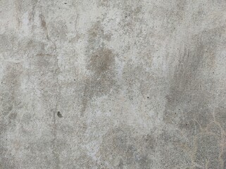 Grunge plastered cement concrete wall background texture.concrete wall texture background.Grunge disstressed concrete texture.Cracked concrete vintage wall texture old background.Ancient wall pattern.