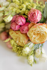 Bright bouquet with roses close up