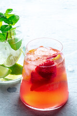 Summer cocktail. Cold drinks with fresh fruits. Healthy mocktails. Citrus and strawberry lemonades