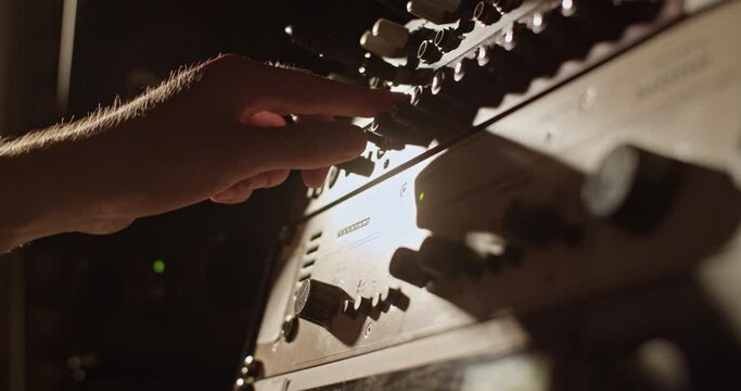 Crop man using illuminated amplifier