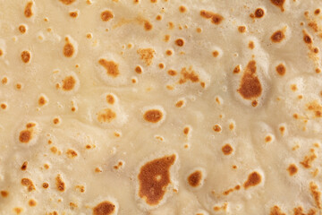 Pan fried pancake as a background.