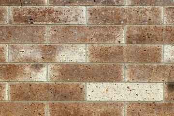 Rock style, beige and brown brick wall texture, Flat photograph.