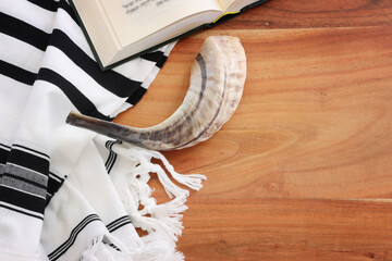 religion image of shofar (horn) on white prayer talit. Rosh hashanah (jewish New Year holiday),...