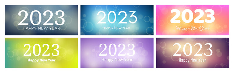 Fototapeta na wymiar Happy new year 2023 incription on blurred background
