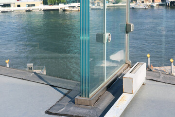 Naklejka premium Resistant laminated glass structure special thickness installed on aluminium frame. 